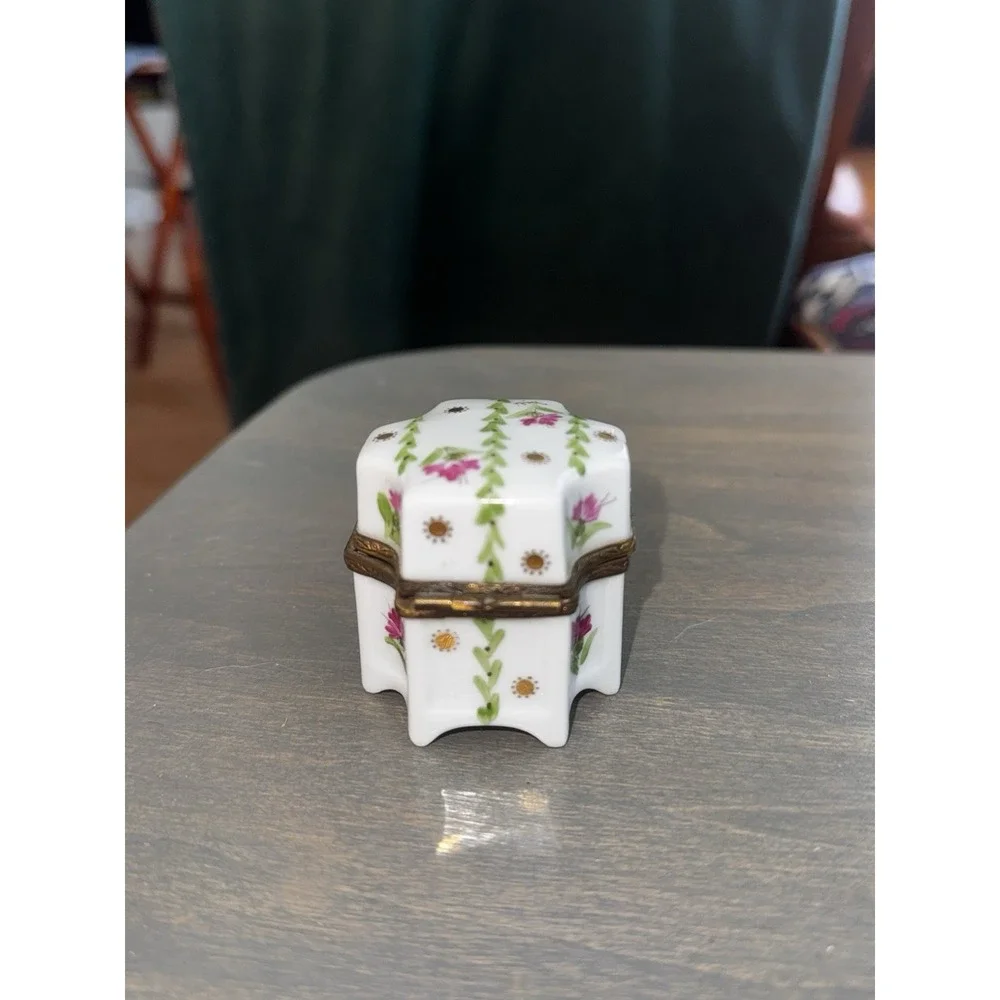 Beautiful authentic vintage French Limoges porcelain footed trinket box.